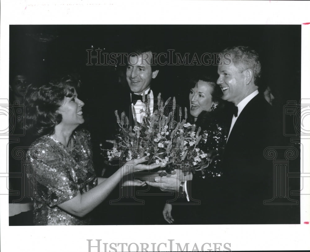 1992 Houston Heritage Society ball chair Patti Everett with bouquet - Historic Images