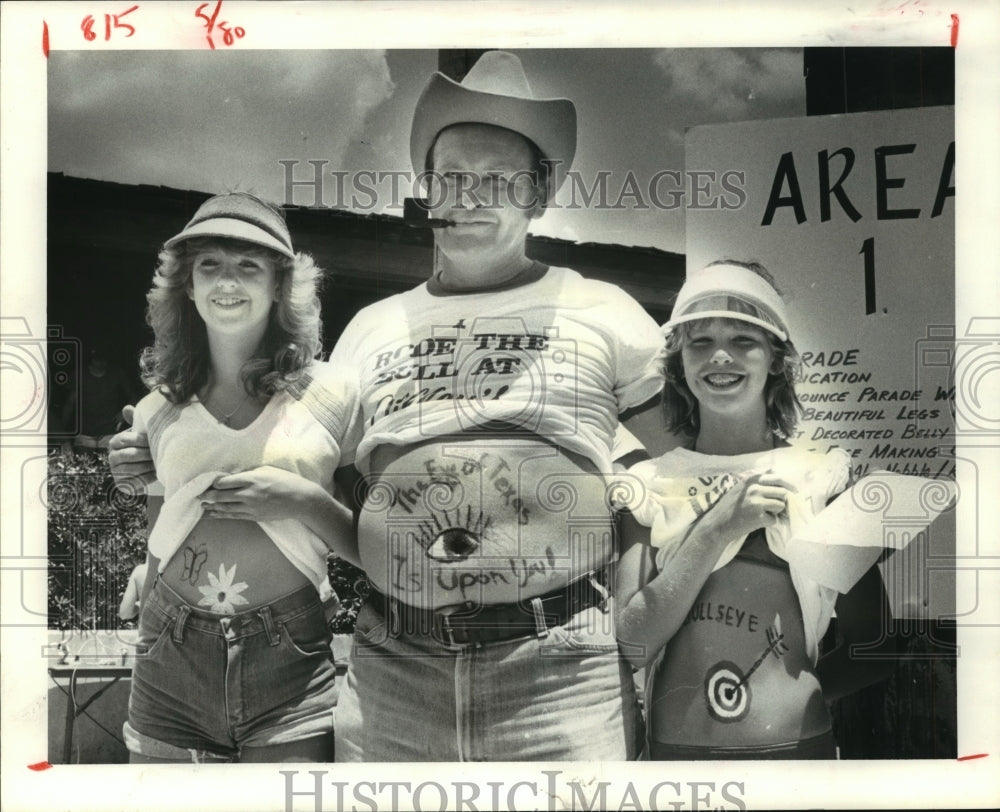 1980 Frank Wilson at belly-button contest at Wharf shopping center - Historic Images