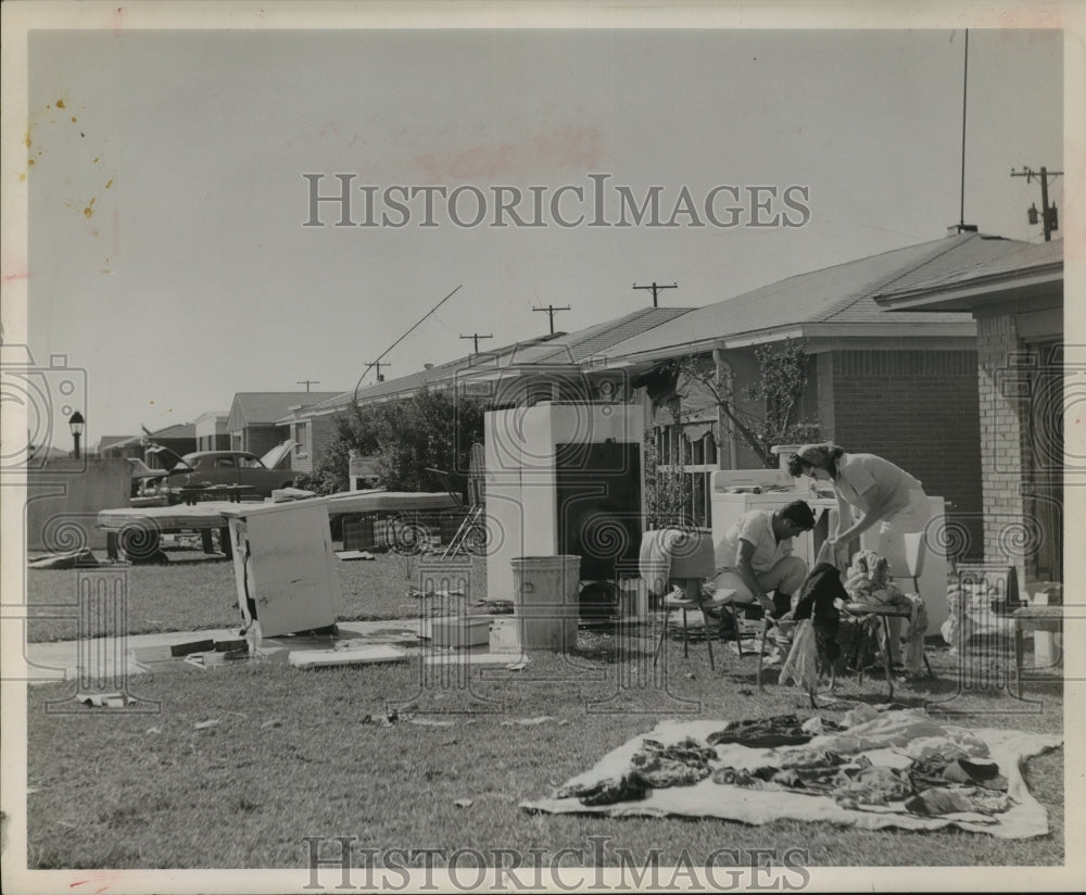 1961 Texas City residents dry out  after hurricane Carla - Historic Images