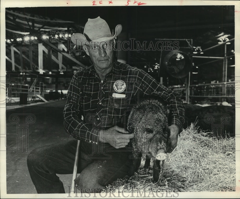 1967 Press Photo Dale Burleson with tamed wild hog in Texas. - hca36490 - Historic Images
