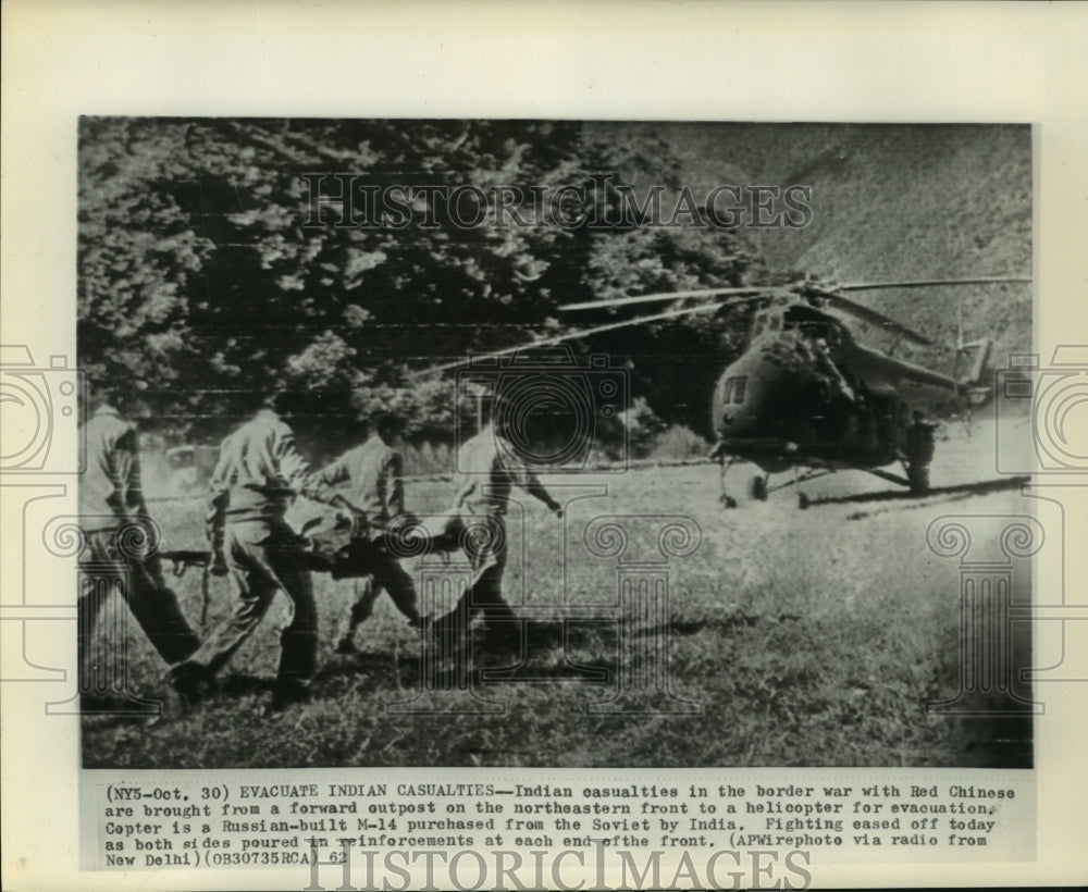 1962 Indian casualties brought to helicopter at Chinese border - Historic Images