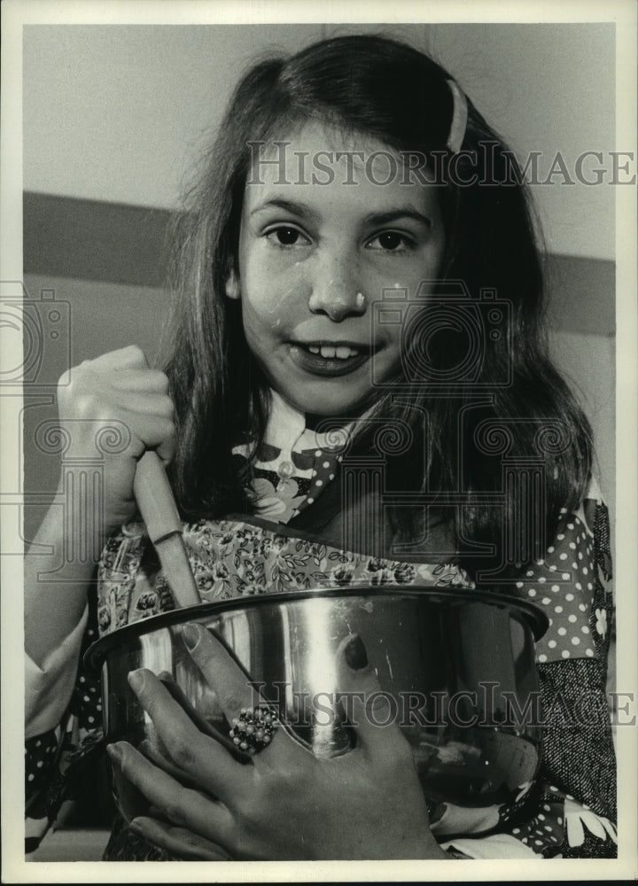 1972 Cynthia Cox bakes cookies at National Jewish Hospital in Denver - Historic Images