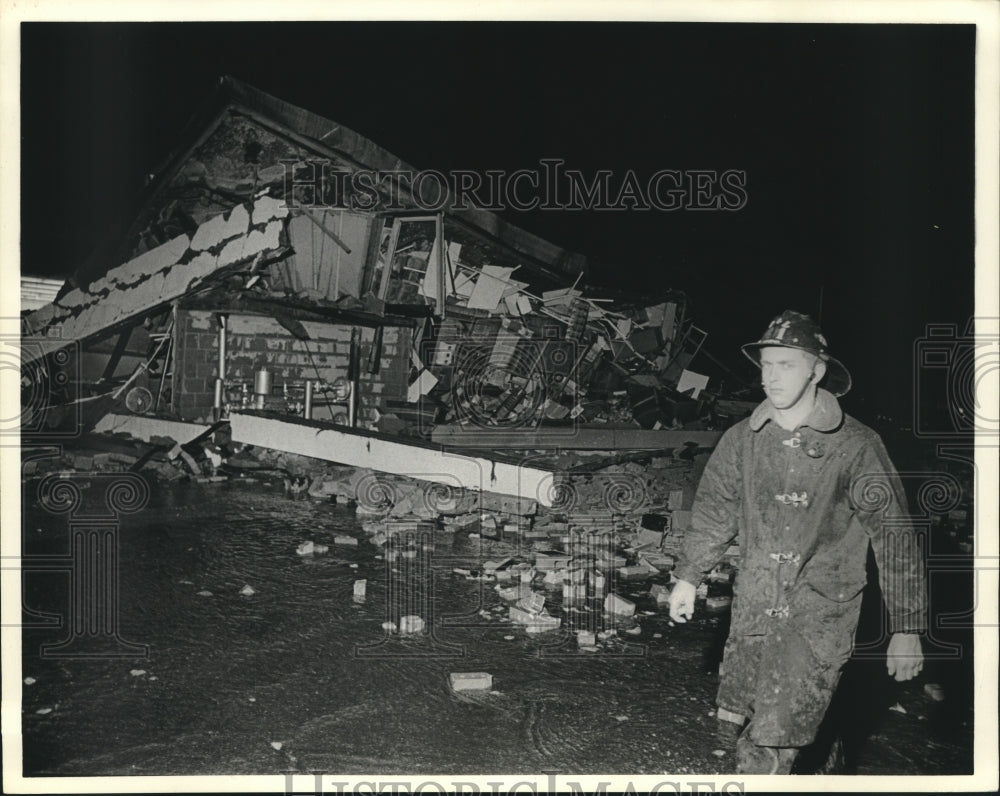 1963 Fireman at collapsed roof of Northline Mall-Houston - Historic Images