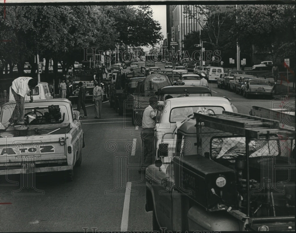 1964 Army of mosquito fogging trucks gather on Houston street - Historic Images