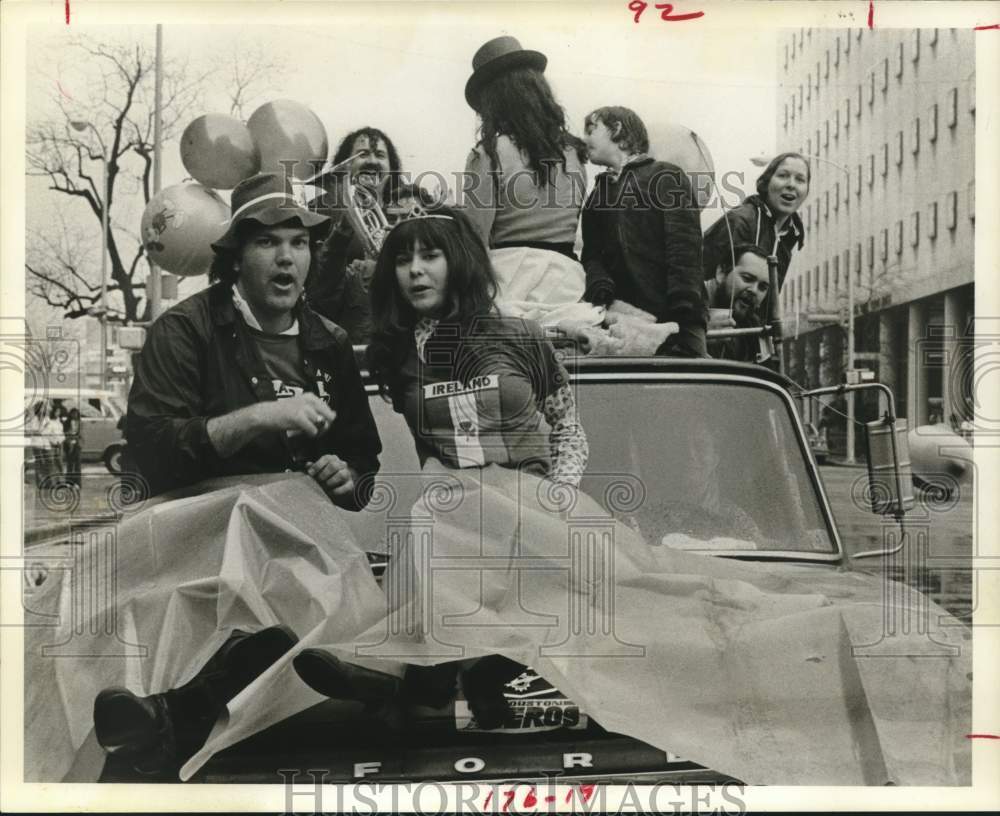 1974 Revelers at Rainy St. Patrick&#39;s Day Parade in Houston,Texas - Historic Images