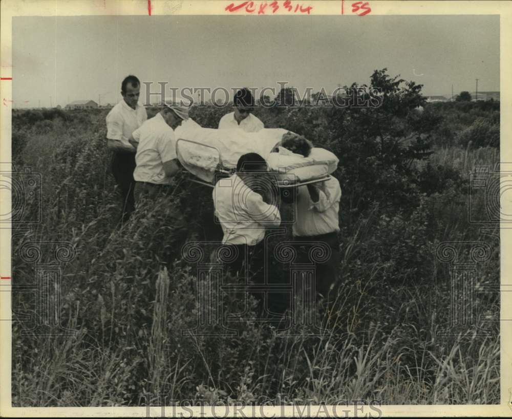 1966 Press Photo Authorities Carry Person from Airplane Crash in Houston, TX- Historic Images