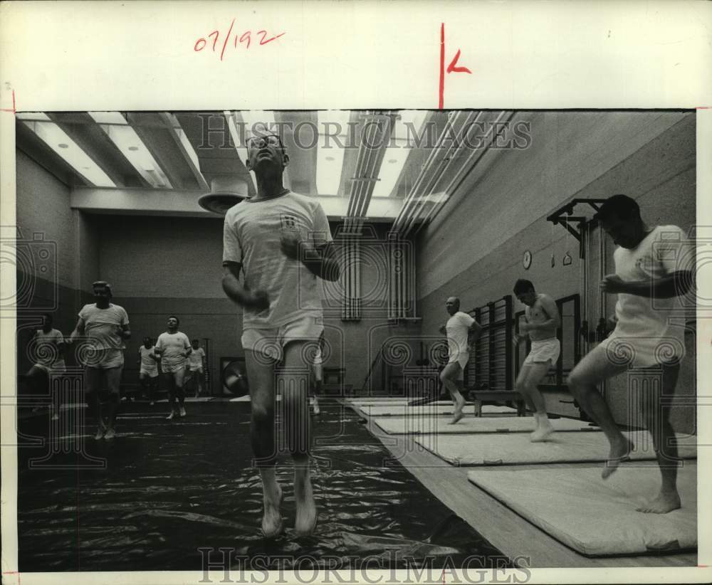 1968 Press Photo Men jog in place during exercise class at University of Texas - Historic Images