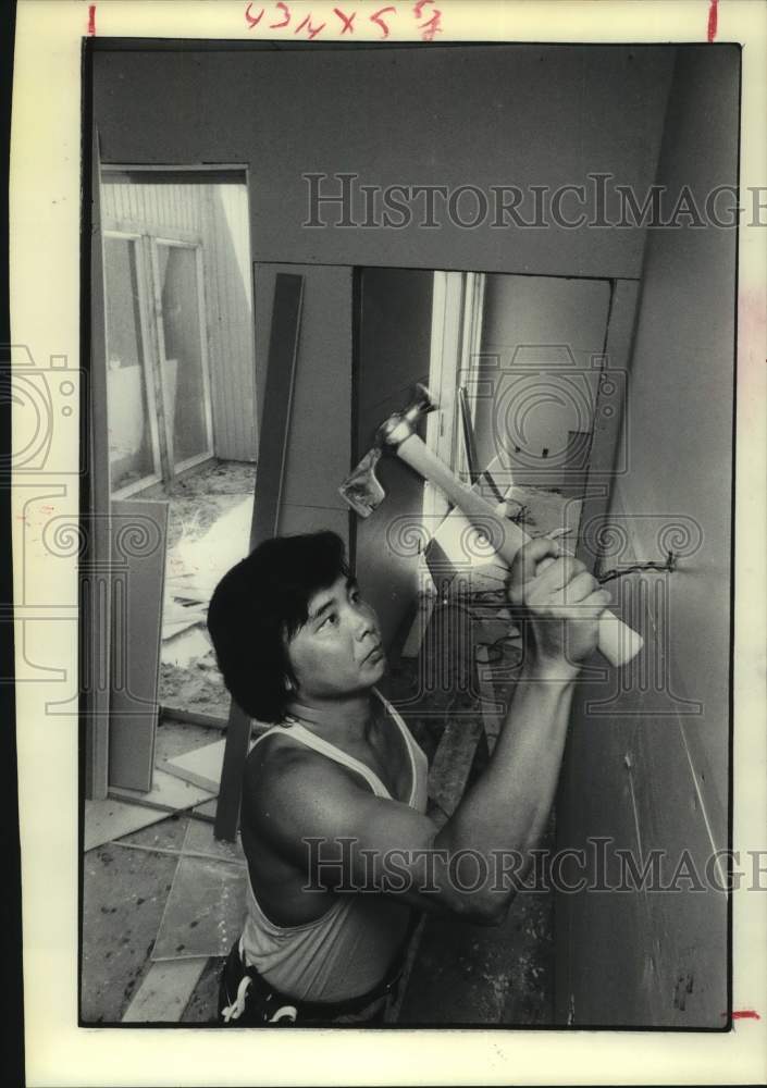 1975 Vietnam Refugee Ky Trinh Does Sheetrocking in Houston - Historic Images