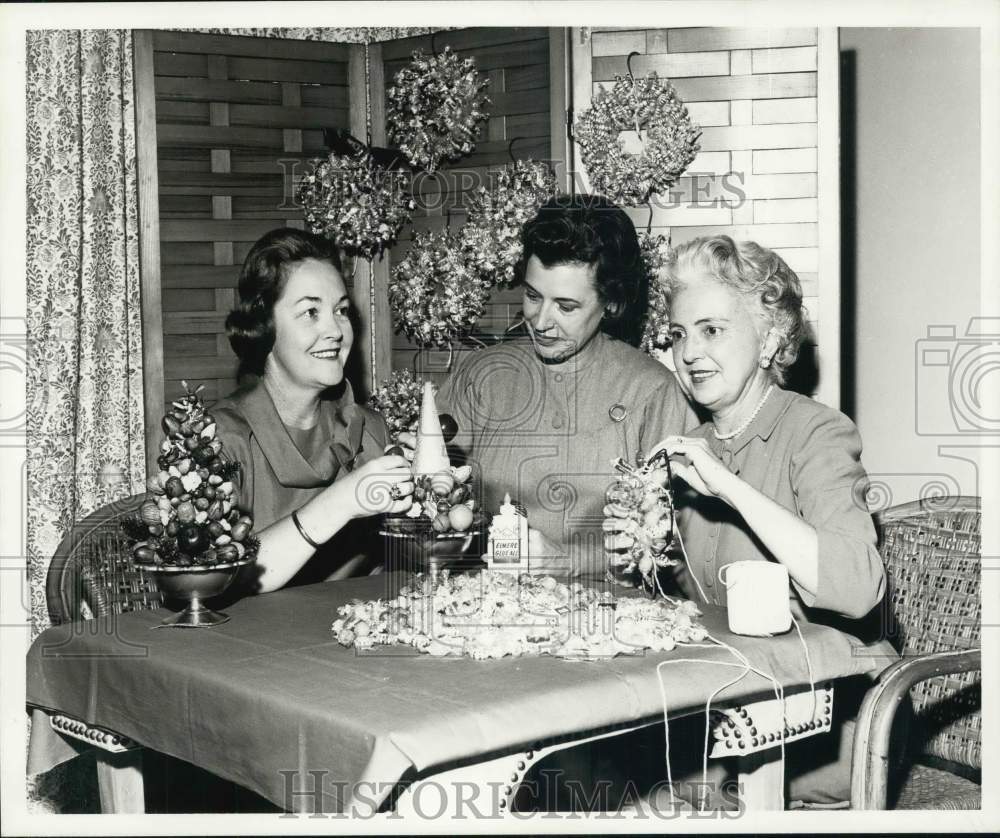 1962 Zeta Tau Alphas prepare for Santa&#39;s Workshop Sale-Historic Images