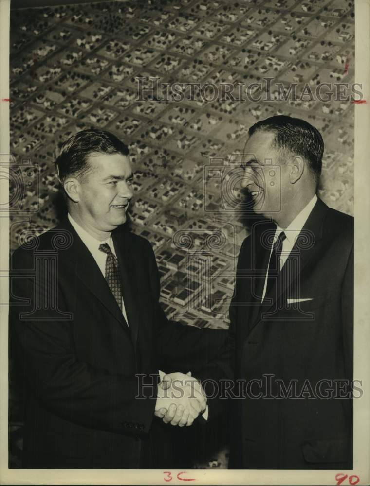 1956 Press Photo Joe Butler and John Jones shake hands; Univ of Texas executives - Historic Images