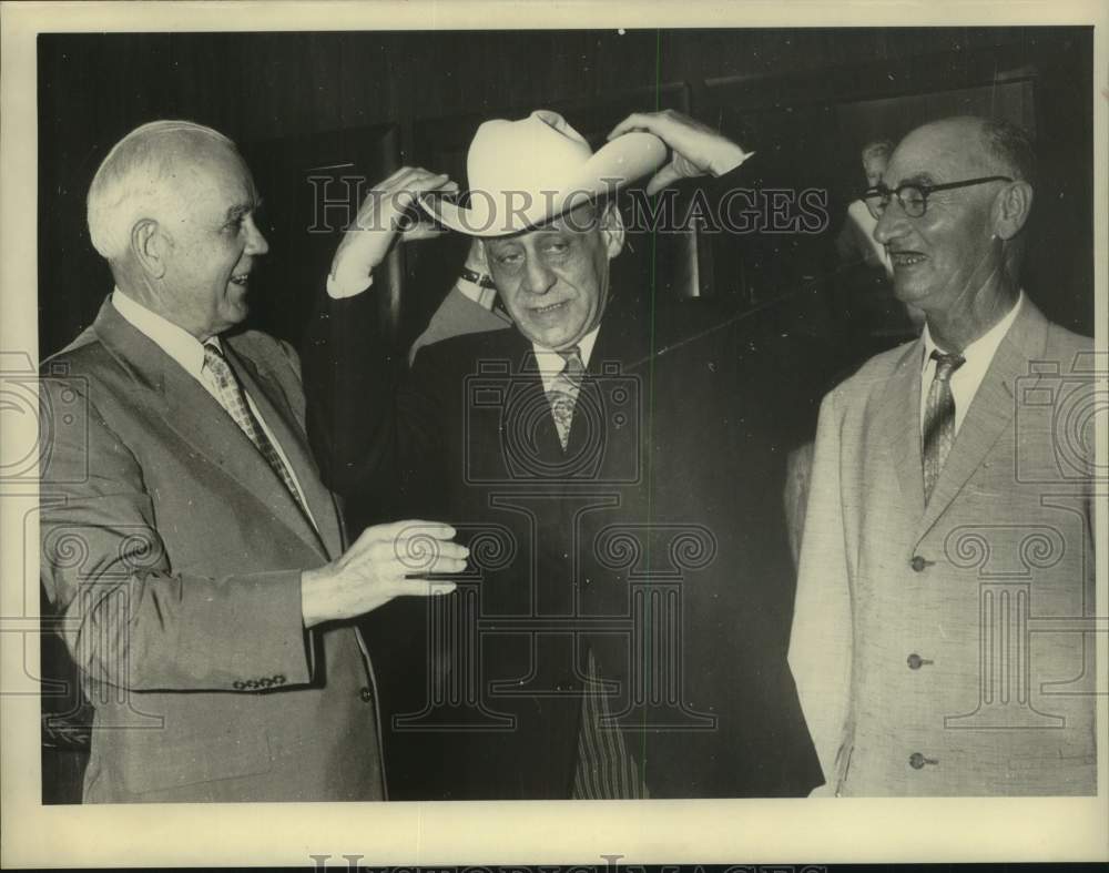 1957 Robert Briscoe tries on cowboy hat-Historic Images