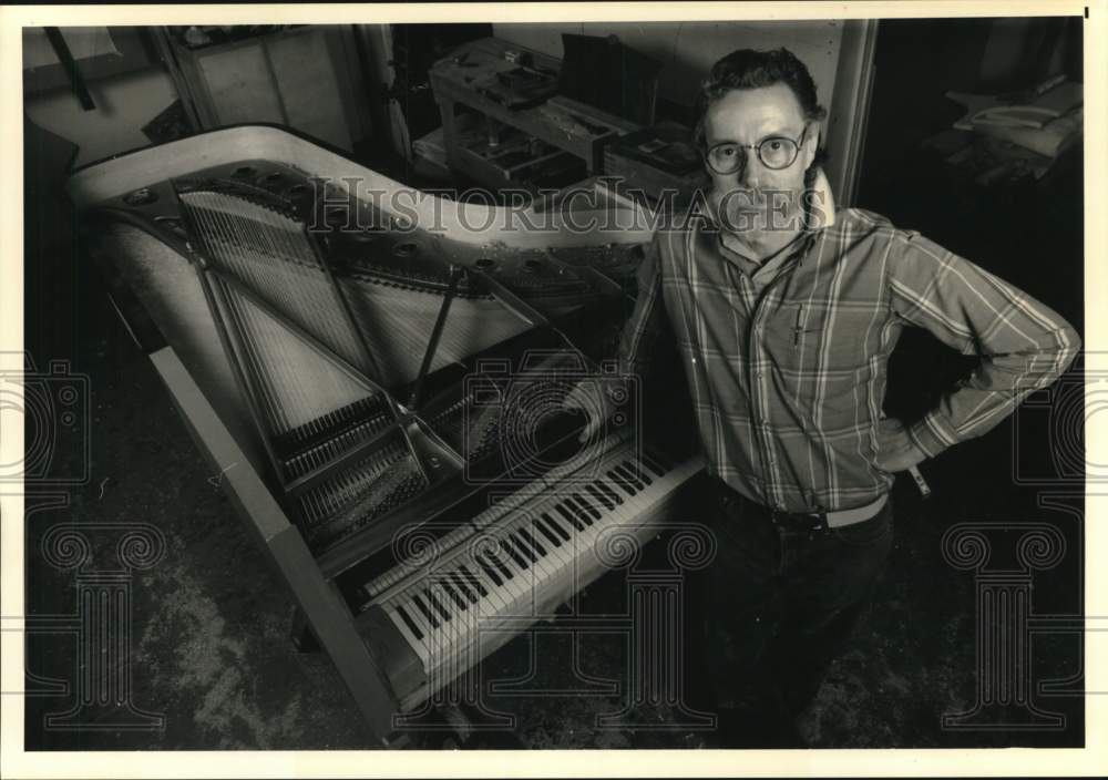 1988 Press Photo Musician stands next to open piano - hca77899- Historic Images