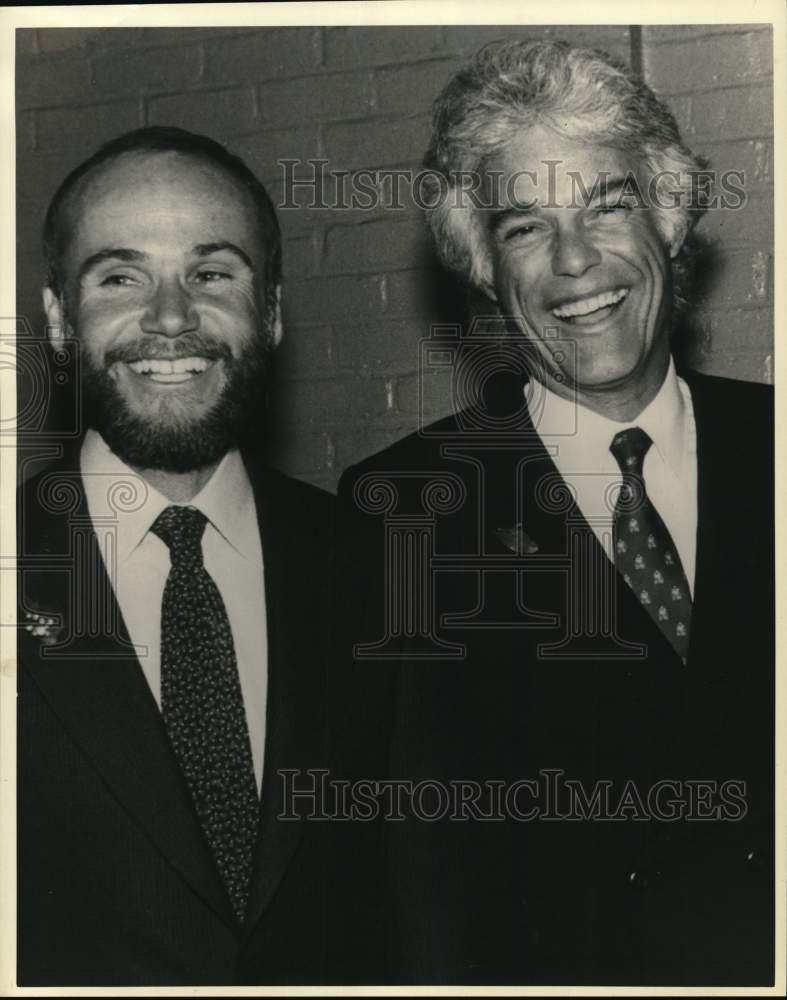 1985 Press Photo Robert Christiansen, television producer laughs with a friend- Historic Images