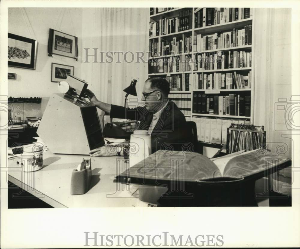 1977 Author Richard Condon in his study-Historic Images