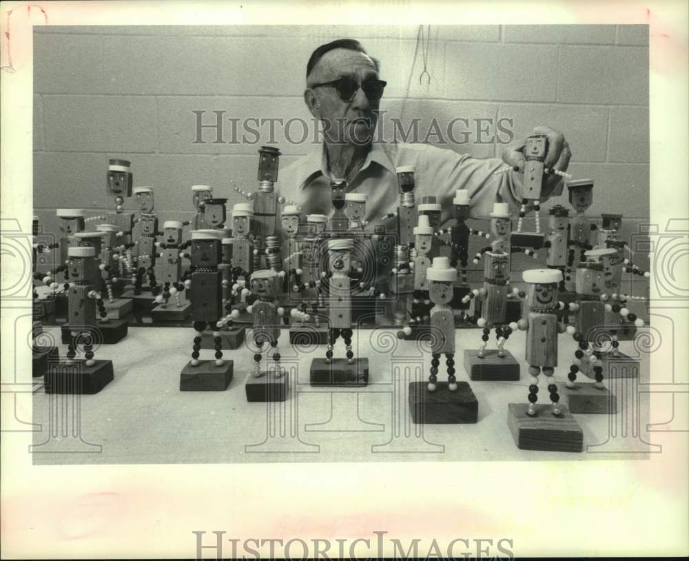 1984 Joseph Dearden Shows Off Doll Collection in Houston, Texas - Historic Images