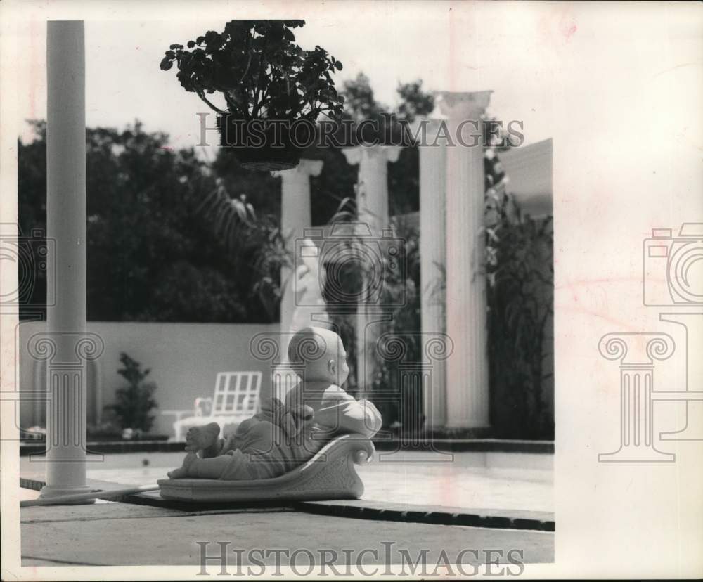 1967 A statue in the Mediterranean garden of Jinx Dobbin's home-Historic Images