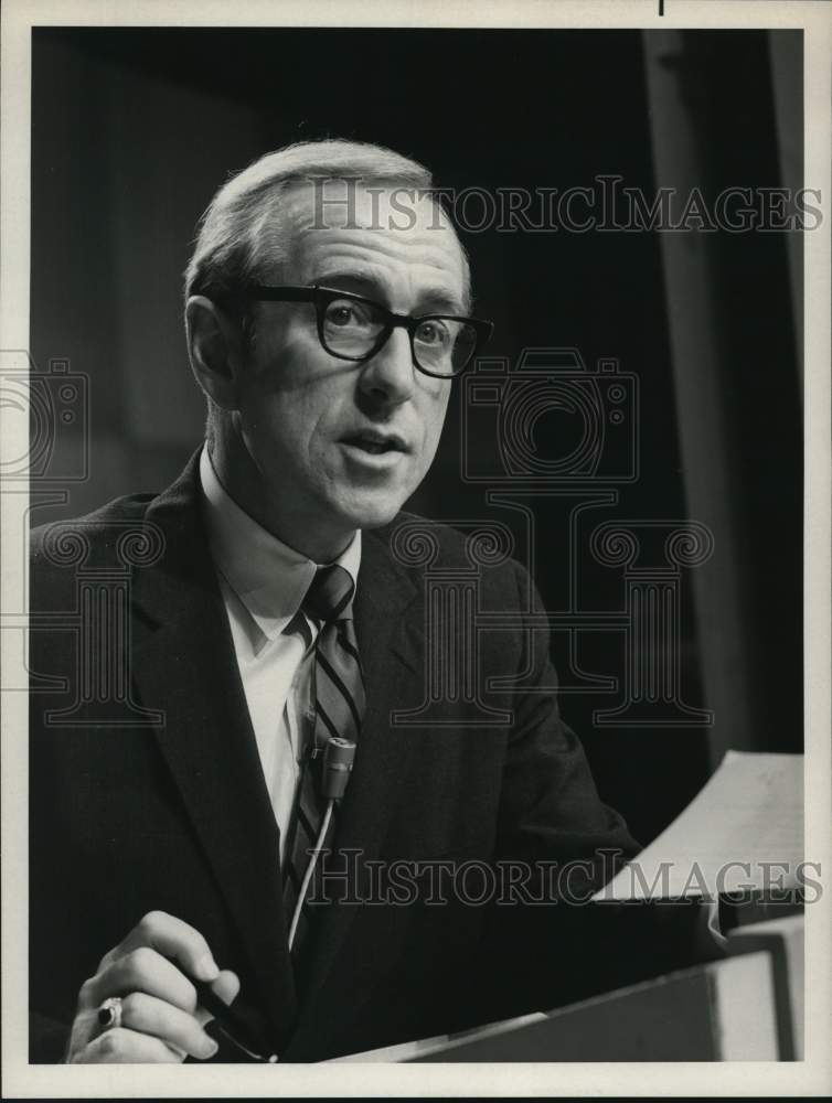 1969 Robert Earle speaks to audience from podium-Historic Images