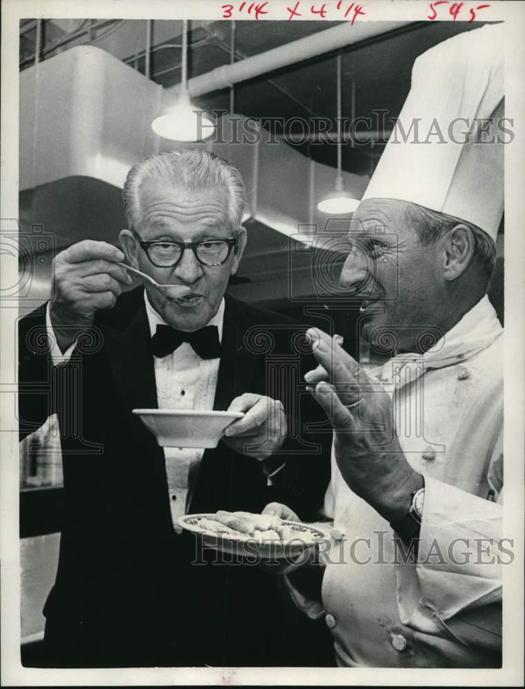 1966 Fred Parks tries Lobster bisque from head chef, Charles Finance-Historic Images