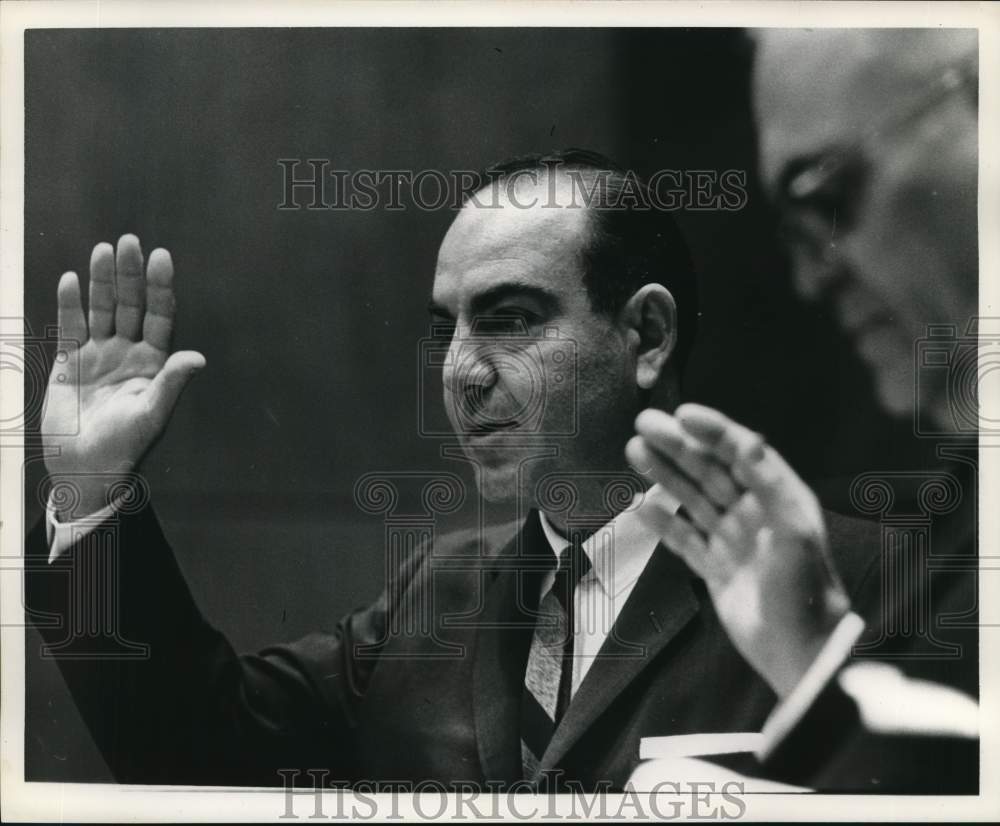 1963 Joseph Guarino raises hand in meeting-Historic Images