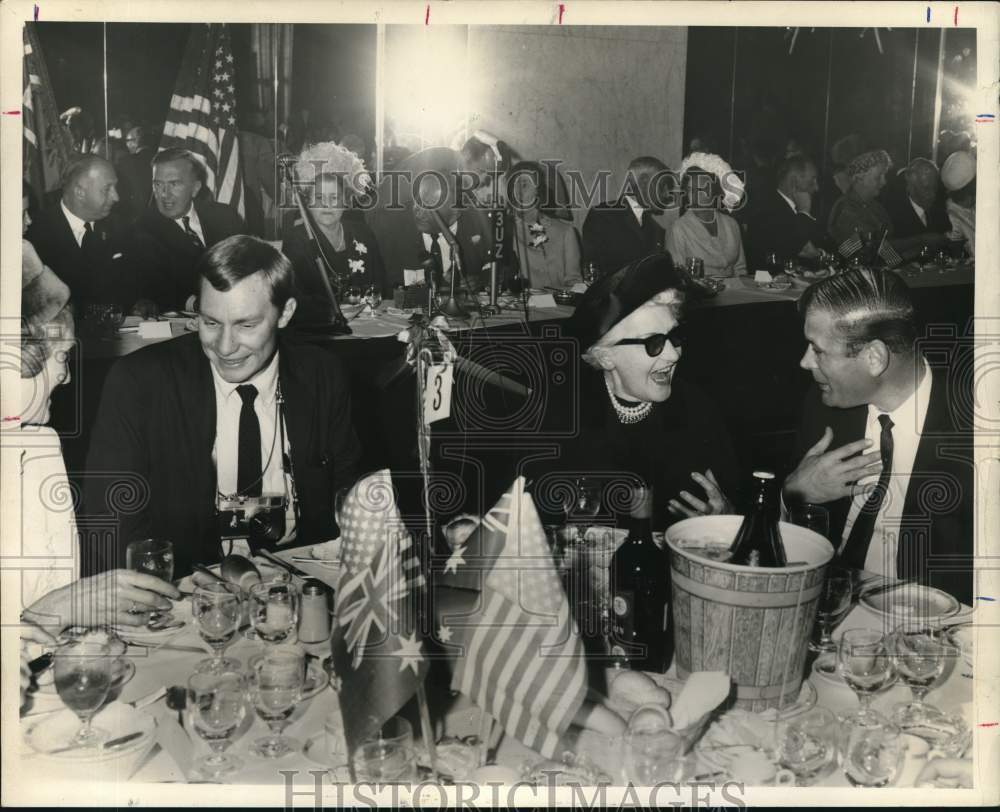 1966 Oscar Griffin talks with woman while at dinner with the Queen.-Historic Images