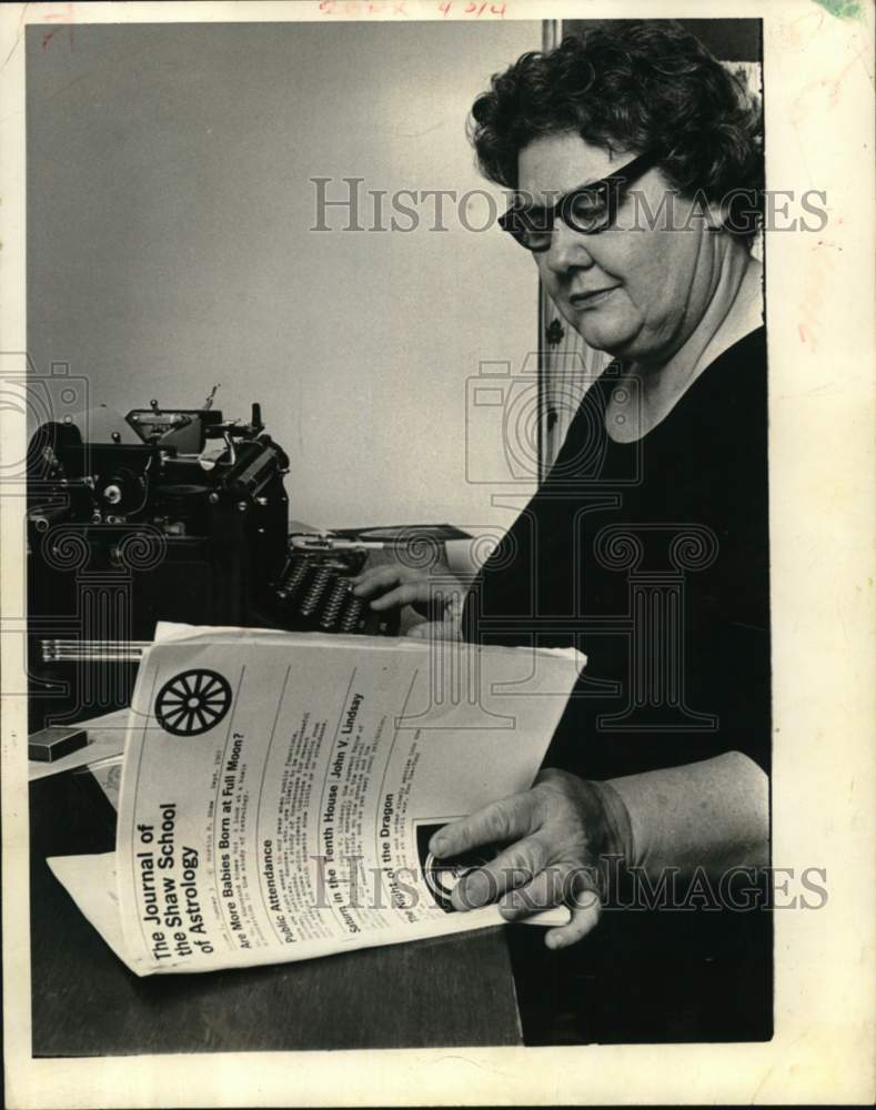 1969 Betty Sue Green looks over a astrology book.-Historic Images