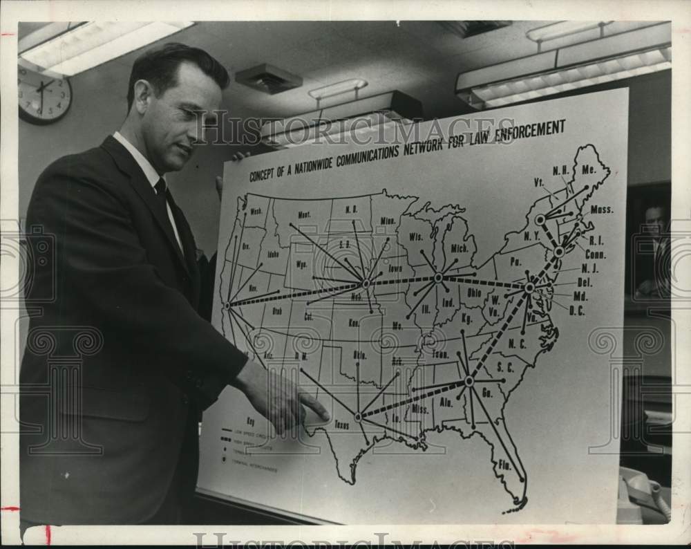 1966 Frank Hilt with map of new nationwide communication network.-Historic Images