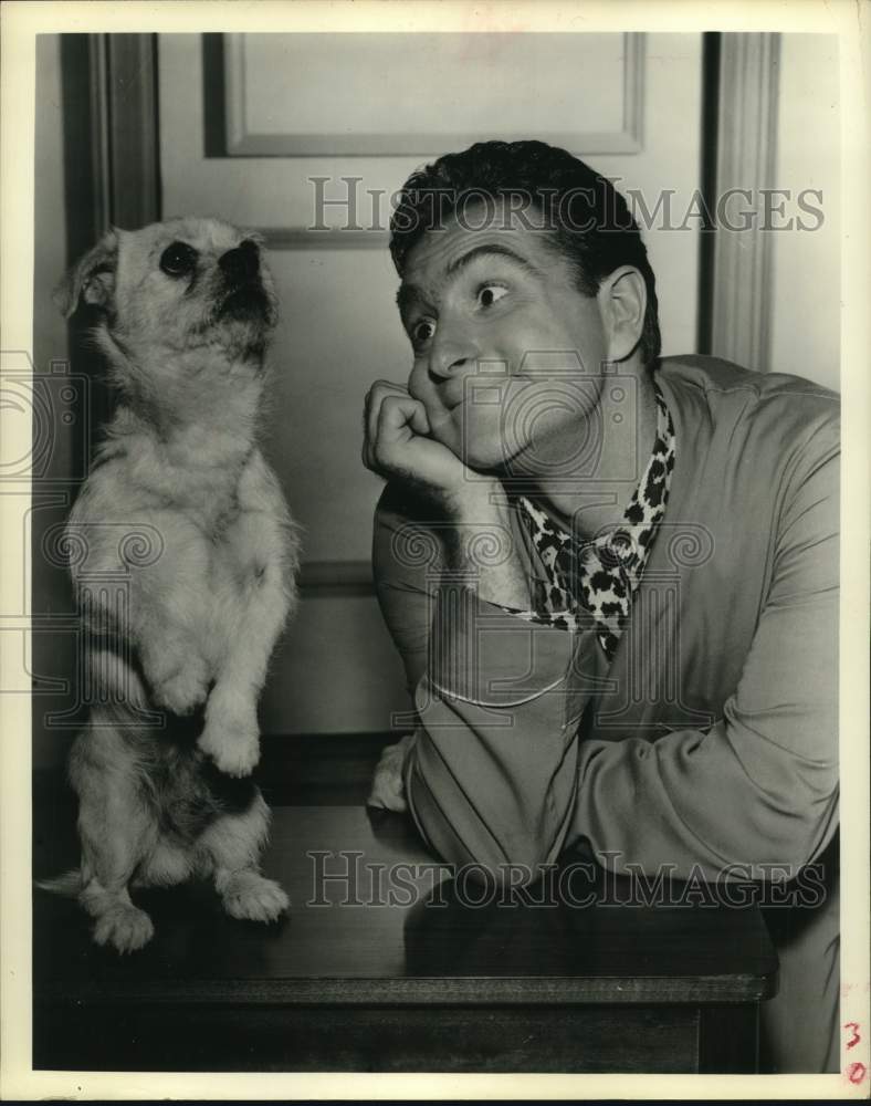 1962 Actor Marty Ingels watches dog trick-Historic Images