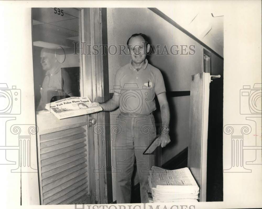 1966 Hyman Irving delivers paper to Houston Chronicle departments-Historic Images