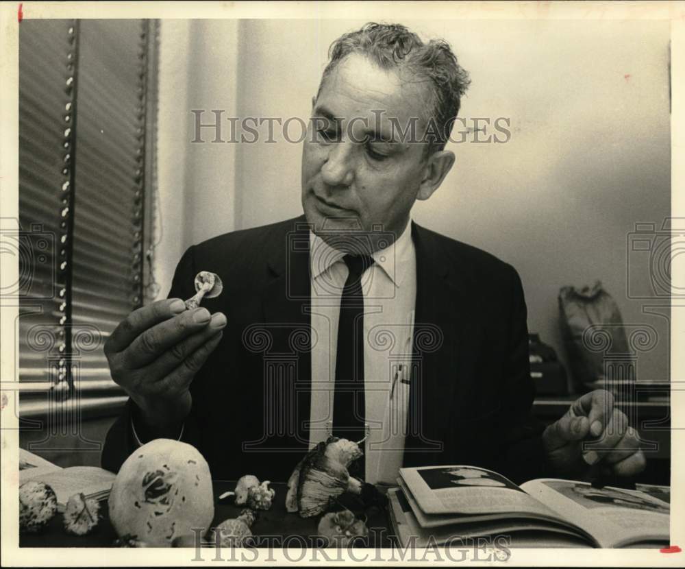 1965 Captain Leo Horton identifies mushrooms - Houston-Historic Images