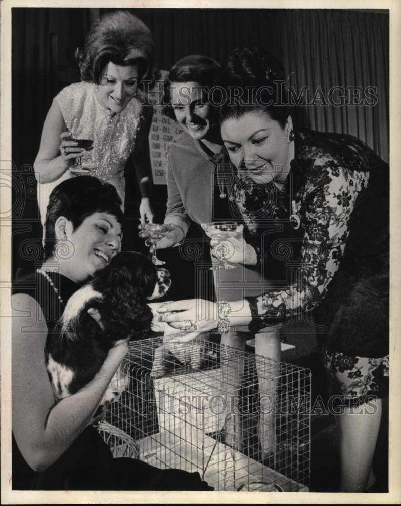 1967 Champagne and canine benefit auction for Texas rehab, Houston-Historic Images