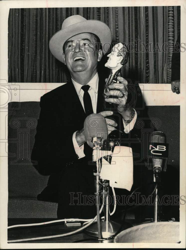 1966 Vice-President Hubert Humphrey laughs at doll in Dallas-Historic Images