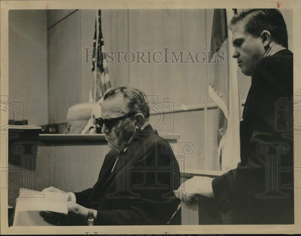 1964 Court secretary Marvin Jackson examines vouchers-Historic Images