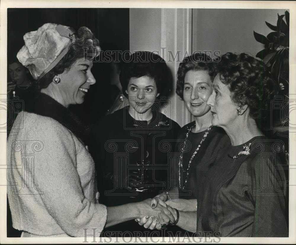 1961 Mrs. Albert Ladner greets guests at mother-daughter luncheon.-Historic Images