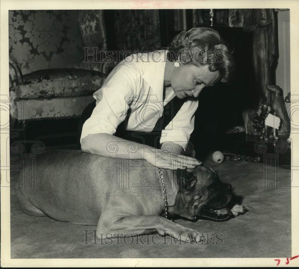 1959 Mrs. George P. Kelley of Houston carefully petting a dog.-Historic Images