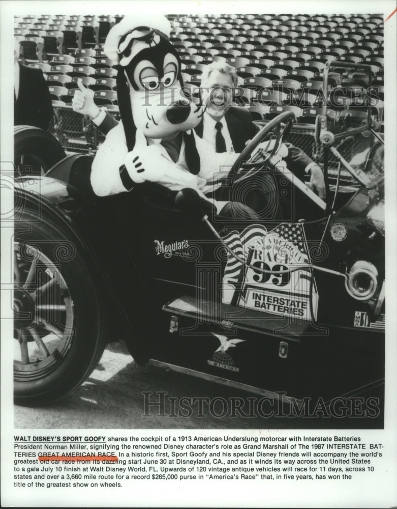 1987 Norman Miller and Goofy in 1913 Underslung motorcar - Historic Images