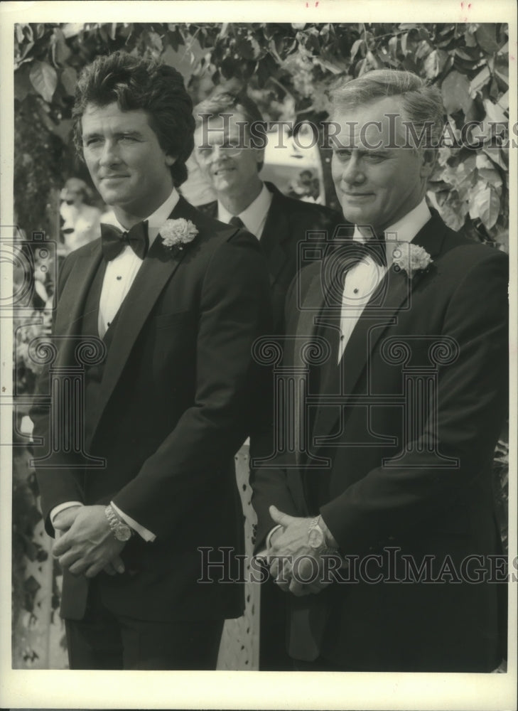 1986 Press Photo Actors Patrick Duffy, Larry Hagman starring in "Dallas" on CBS. - Historic Images