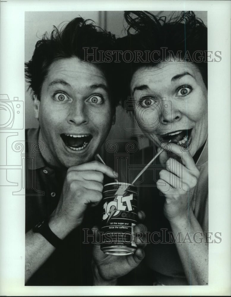 1987 Press Photo Comedy Workshop actors with Jolt can and straws. - hcp03966- Historic Images