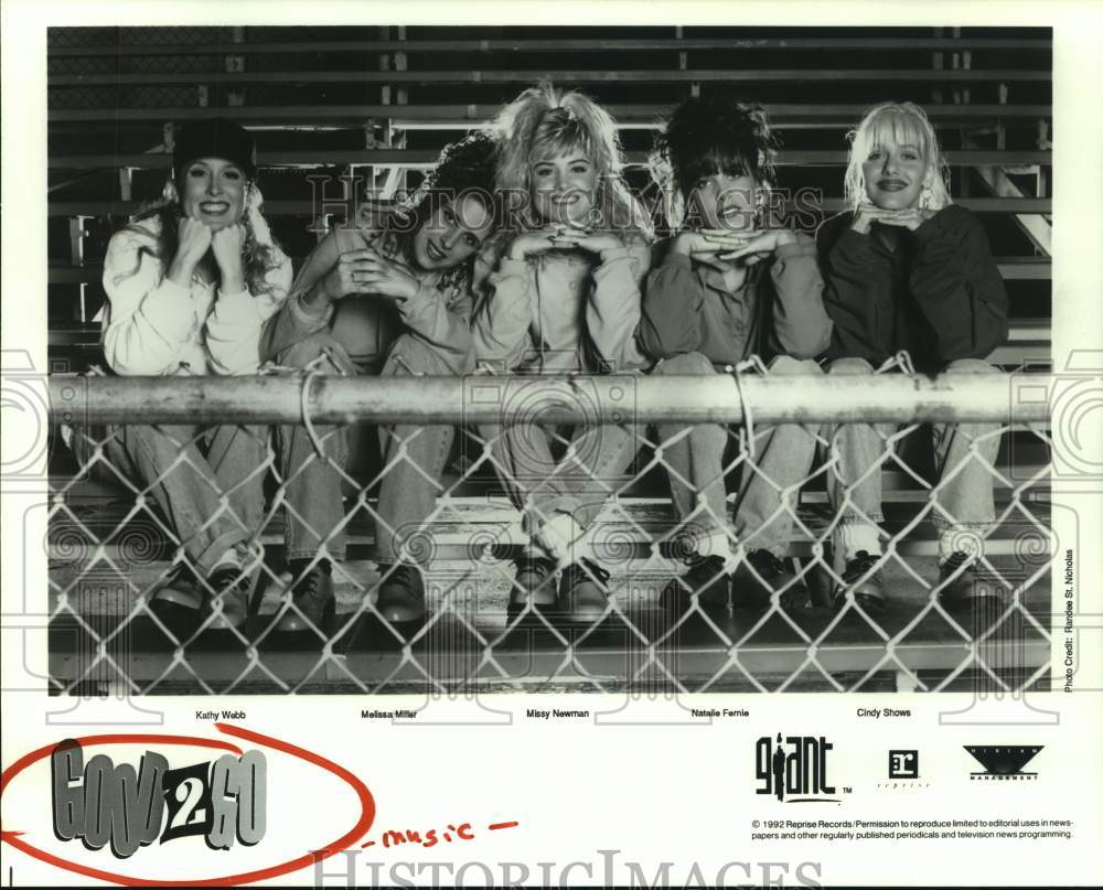 1992 Press Photo Good 2 Go female vocal group sit on stadium bleachers- Historic Images