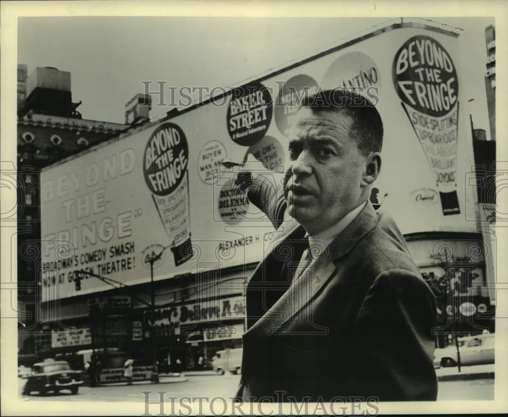 1963 Broadway producer Alexander H. Cohen with billboard of his play-Historic Images