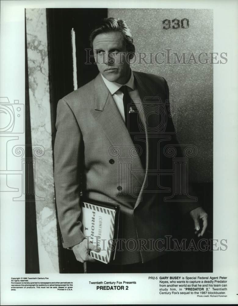 1990 Actor Gary Busey appears in "Predator 2" scene - Historic Images