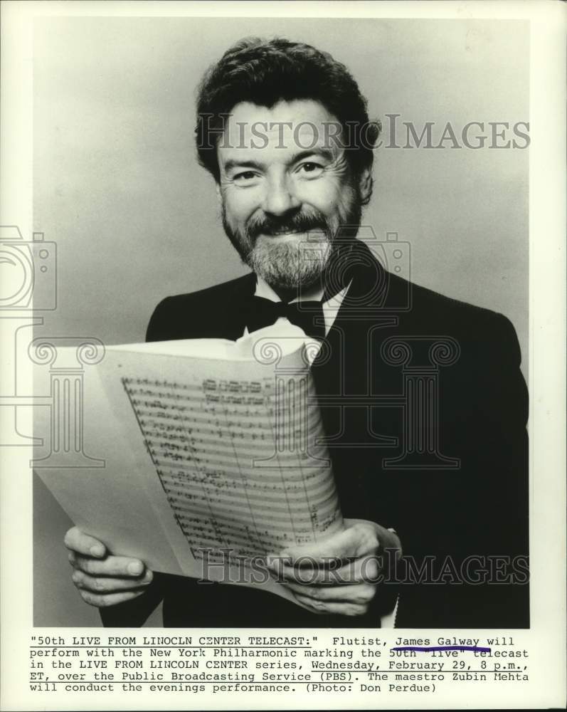 1984 Press Photo Flutist James Galway Holds Sheet Music - Historic Images