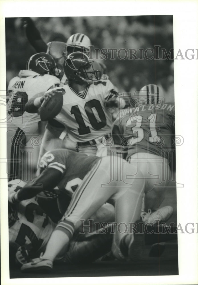 1992 Press Photo Atlanta Falcons Football Quarterback Unber Ten at Game - Historic Images