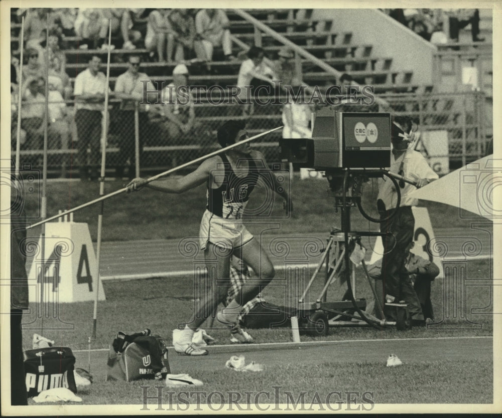 1967 U.S. Olympian Frank Covelli throws javelin at Pan Am Games - Historic Images