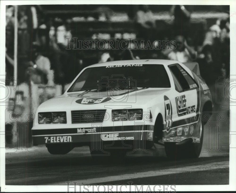 1980 The 7-Eleven/Chief Auto parts dragster launches off the line. - Historic Images