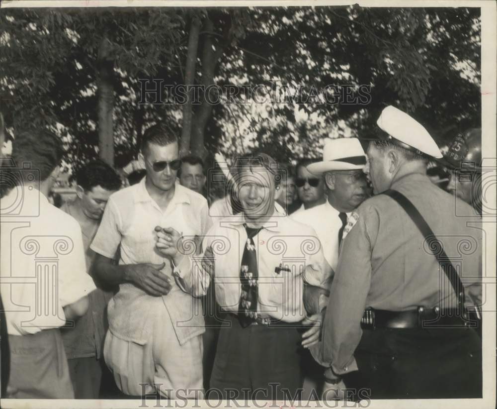 1953 Press Photo Officers rescue a victim of Alco Fireworks explosion - Historic Images