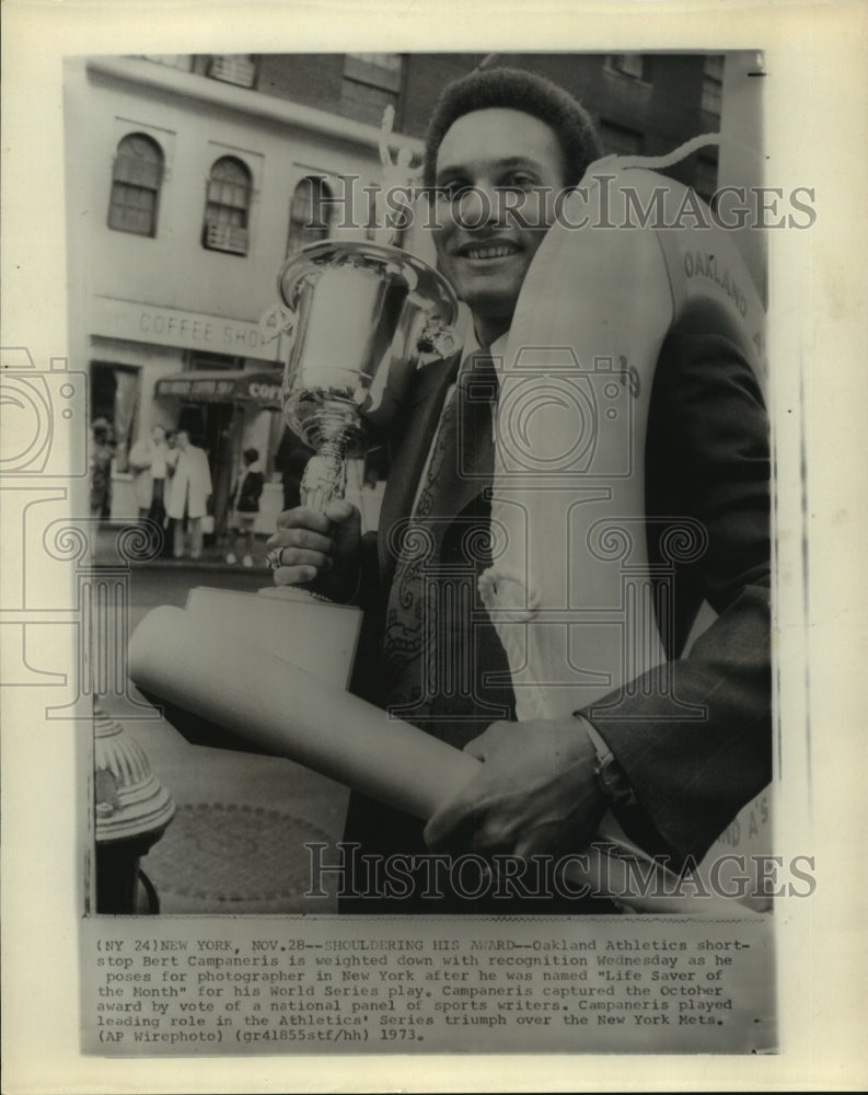 1973 Oakland Athletics shortstop Bert Campaneris shoulders award. - Historic Images