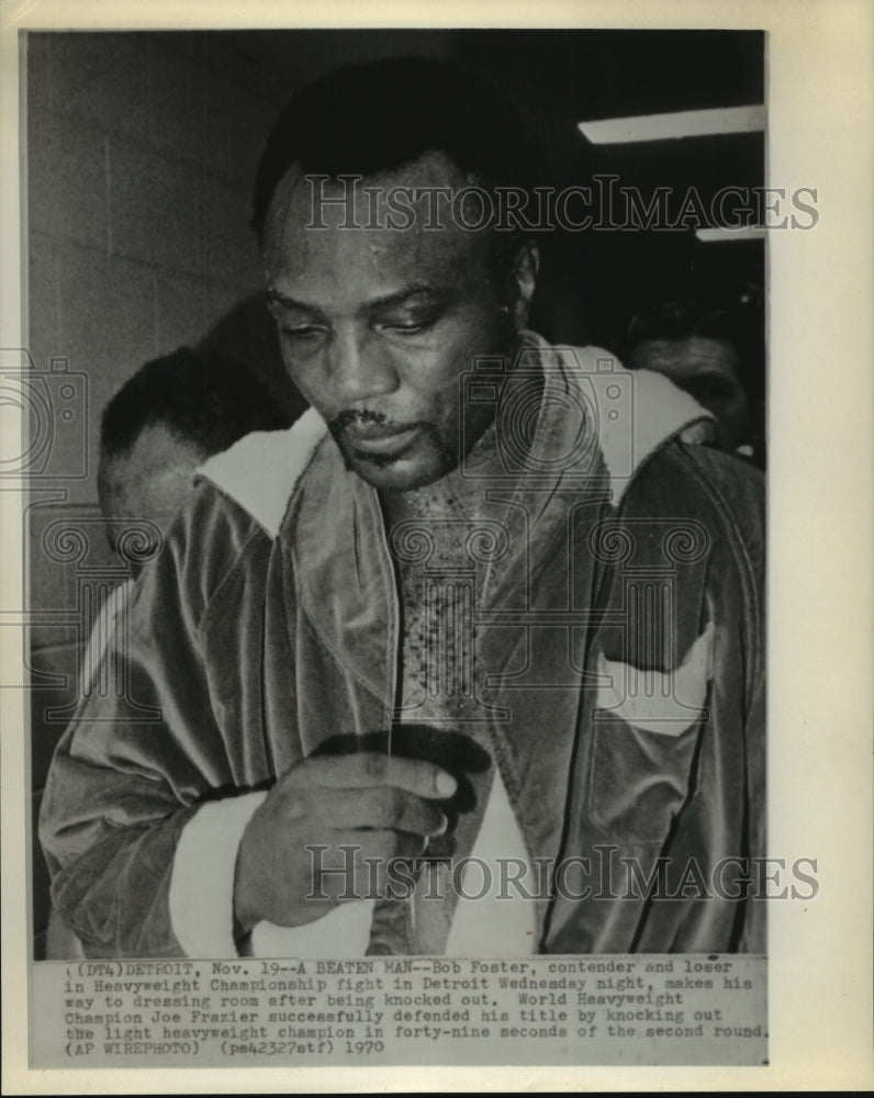 1970 Press Photo Contender Bob Foster knocked out by Joe Frazier in title bout.- Historic Images