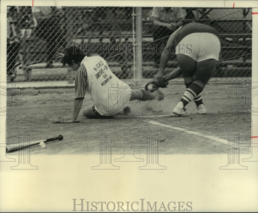 Press Photo Kathy Grizzaffi slides safely into home in a softball game.- Historic Images