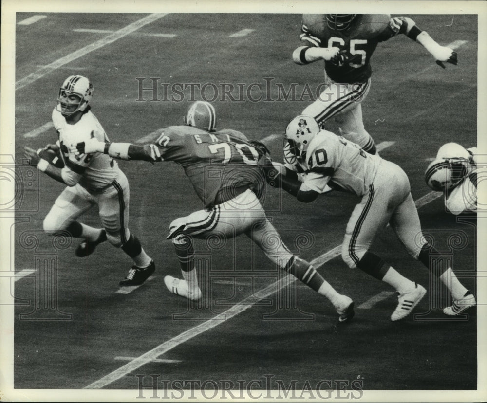1973 Patriots quarterback Jim Plunkett sacked by Oilers' Tody Smith - Historic Images