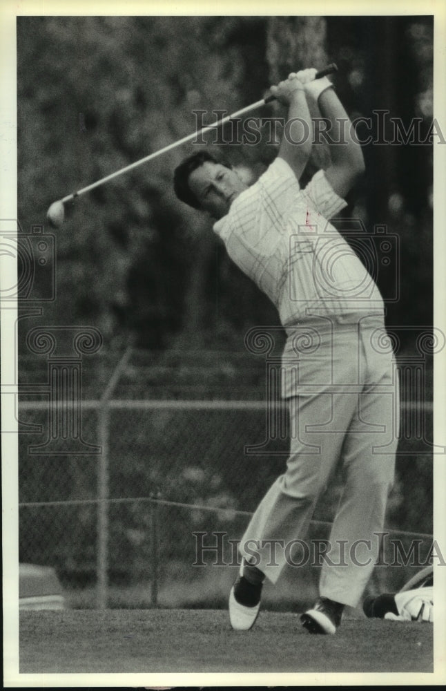 1987 Press Photo Golfer his a shot with his driver. - hcs07433 - Historic Images